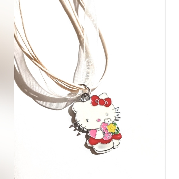 Hello Kitty Holding Flower Bouquet Wearing Red Dress Ribbon Necklace - Picture 6 of 7